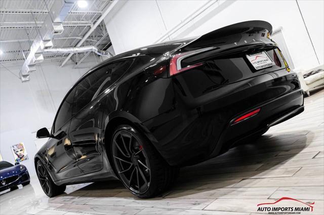 used 2024 Tesla Model 3 car, priced at $46,888