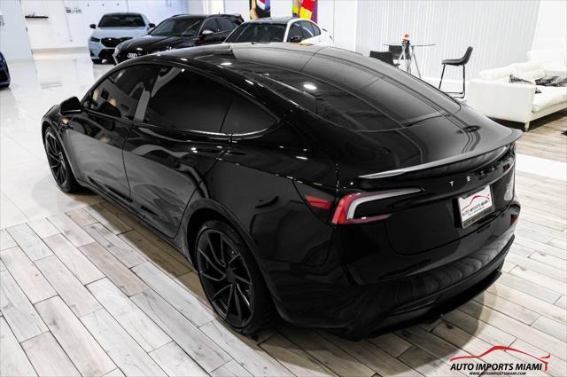 used 2024 Tesla Model 3 car, priced at $46,888