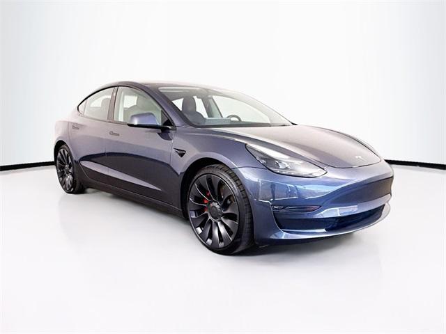 used 2022 Tesla Model 3 car, priced at $27,375