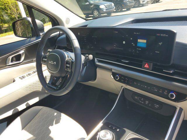 new 2025 Kia Carnival Hybrid car, priced at $48,099