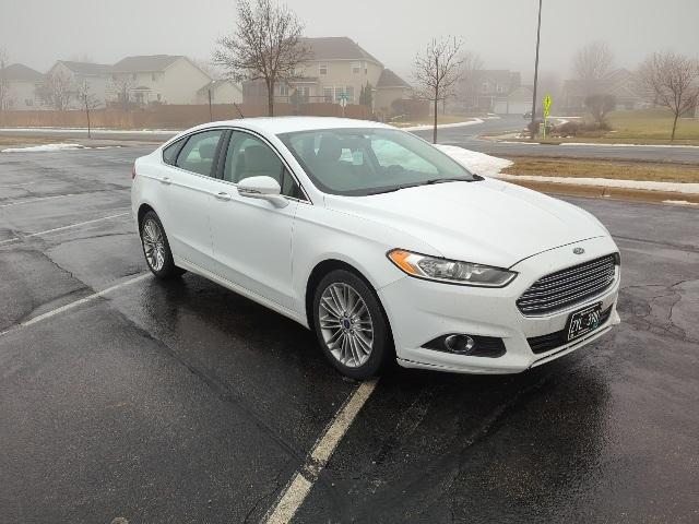 used 2016 Ford Fusion car, priced at $11,999