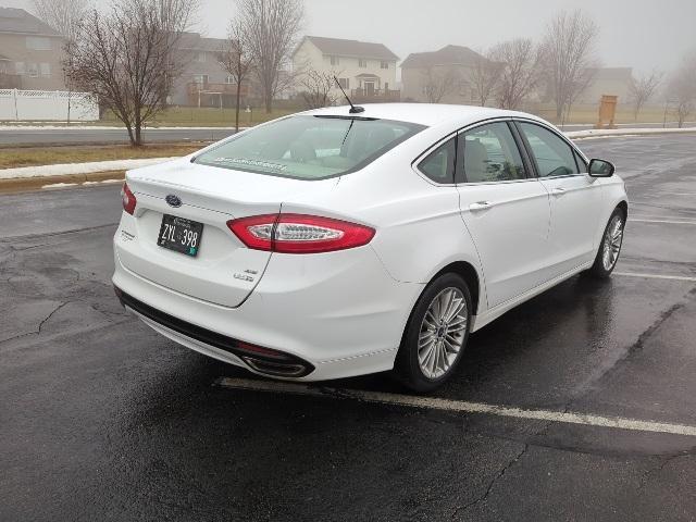 used 2016 Ford Fusion car, priced at $11,999