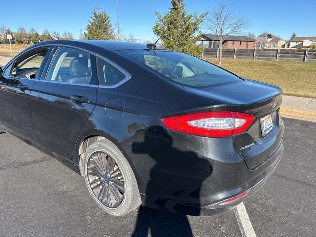 used 2014 Ford Fusion car, priced at $12,999