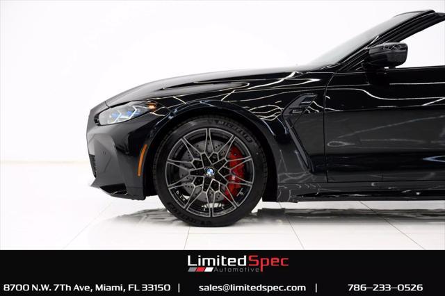 used 2024 BMW M4 car, priced at $84,980