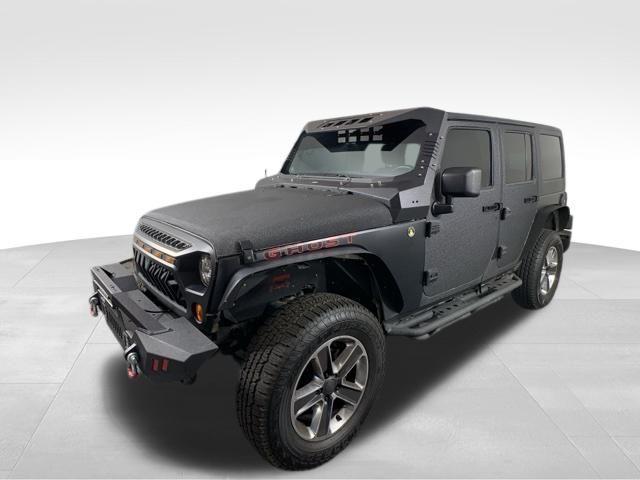 used 2013 Jeep Wrangler Unlimited car, priced at $17,900