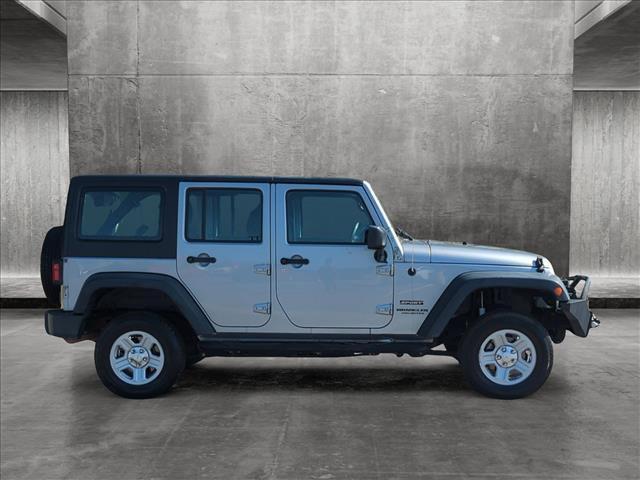 used 2015 Jeep Wrangler Unlimited car, priced at $23,676