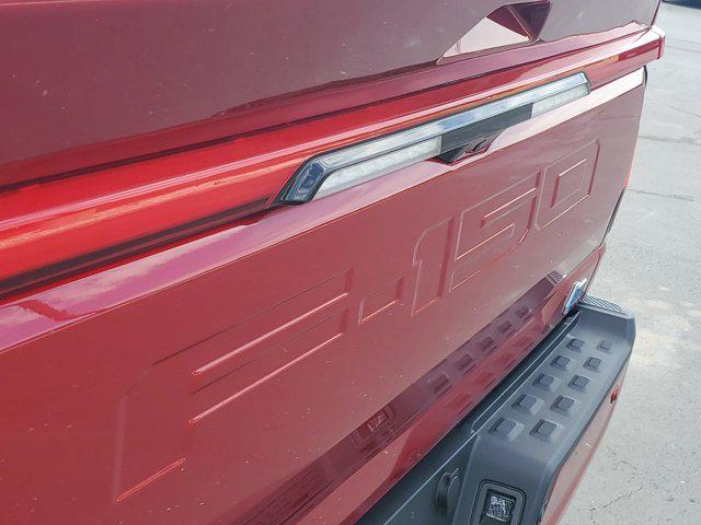 new 2025 Ford F-150 Lightning car, priced at $74,998