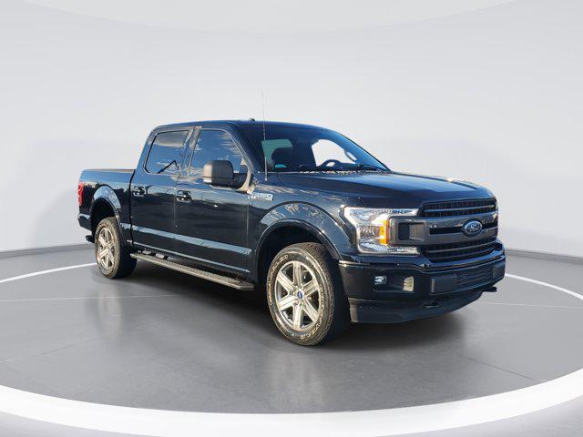 used 2018 Ford F-150 car, priced at $24,570