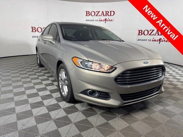 used 2016 Ford Fusion car, priced at $10,000