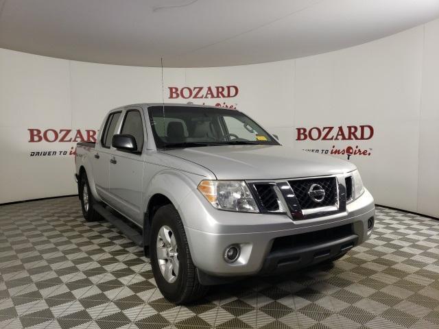 used 2013 Nissan Frontier car, priced at $15,000