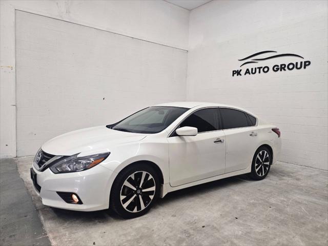 used 2018 Nissan Altima car, priced at $12,999