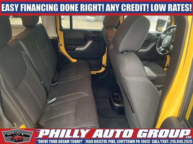 used 2015 Jeep Wrangler Unlimited car, priced at $32,885