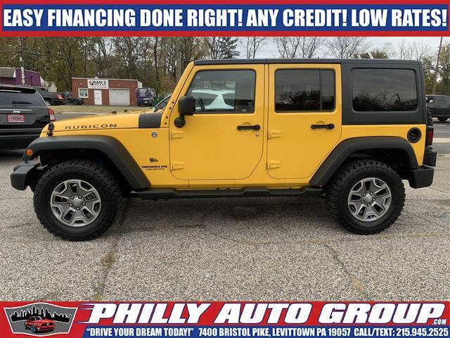 used 2015 Jeep Wrangler Unlimited car, priced at $32,885