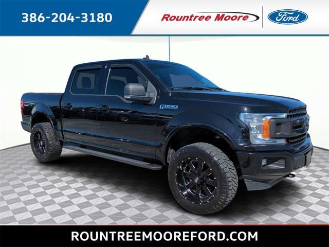 used 2019 Ford F-150 car, priced at $28,590