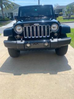 used 2017 Jeep Wrangler Unlimited car, priced at $25,306