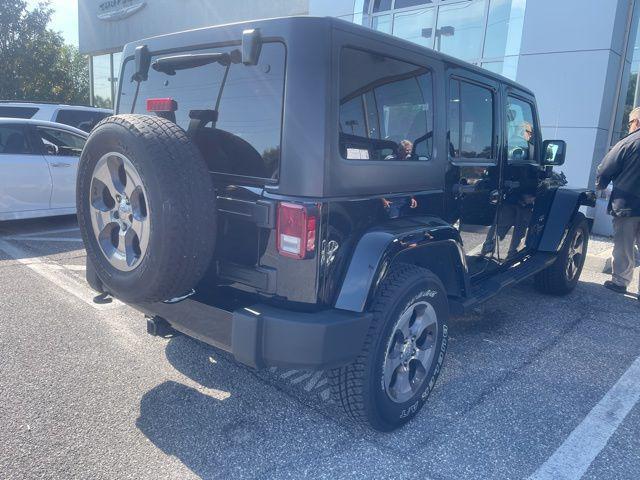 used 2017 Jeep Wrangler Unlimited car, priced at $25,306