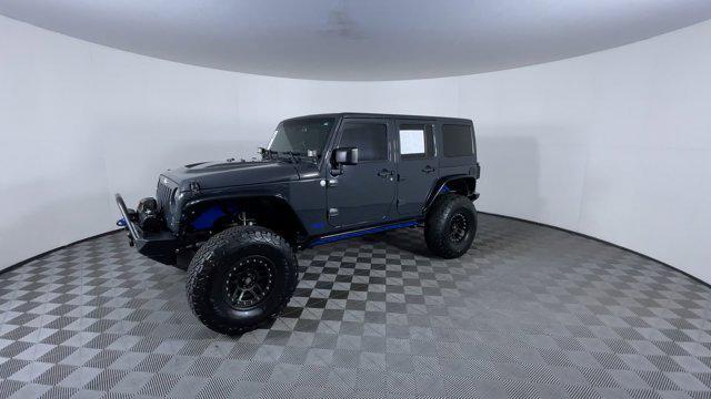 used 2016 Jeep Wrangler Unlimited car, priced at $25,971