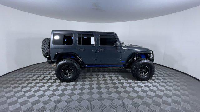 used 2016 Jeep Wrangler Unlimited car, priced at $25,971