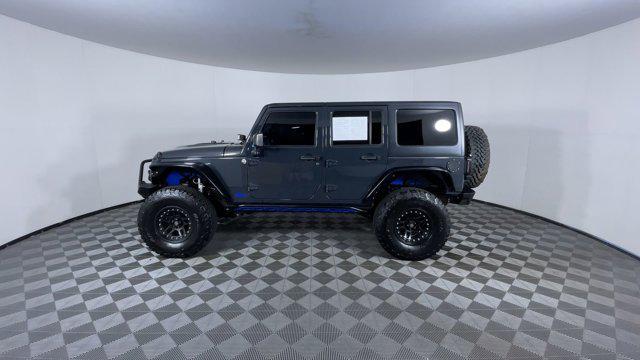 used 2016 Jeep Wrangler Unlimited car, priced at $25,971