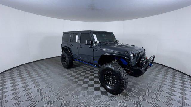 used 2016 Jeep Wrangler Unlimited car, priced at $25,971