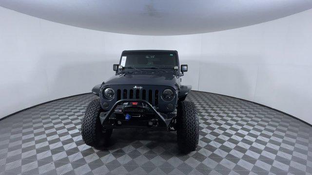 used 2016 Jeep Wrangler Unlimited car, priced at $25,971