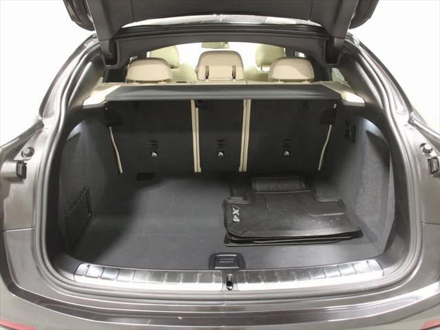 used 2025 BMW X4 car, priced at $58,995