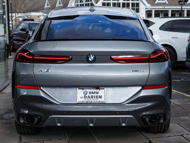 new 2025 BMW X6 car, priced at $83,110