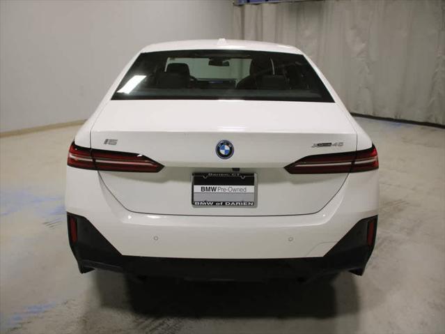 used 2025 BMW i5 car, priced at $74,995