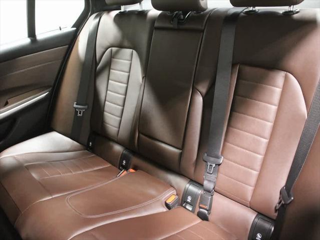 used 2023 BMW 330e car, priced at $40,495