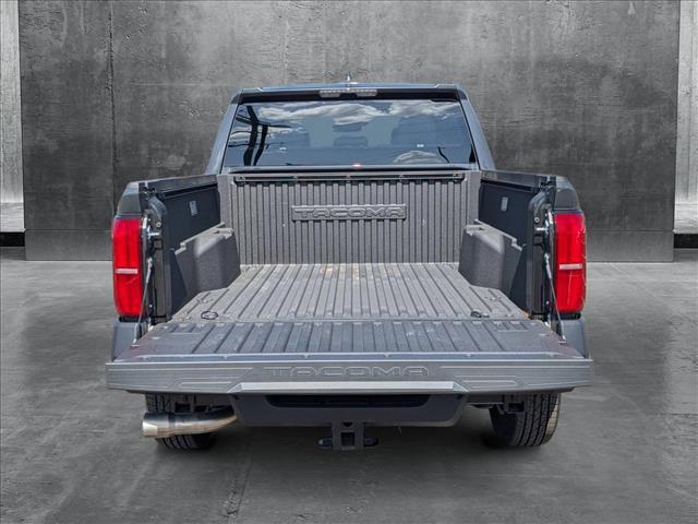 used 2025 Toyota Tacoma car, priced at $37,498