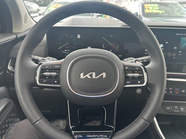 new 2025 Kia Carnival Hybrid car, priced at $54,370