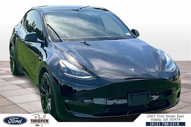 used 2022 Tesla Model Y car, priced at $33,628