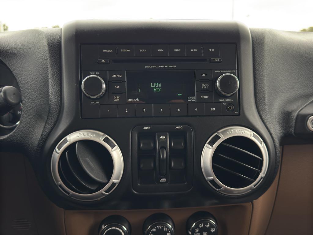 used 2013 Jeep Wrangler Unlimited car, priced at $21,900