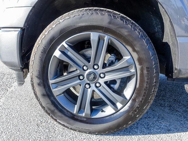 used 2023 Ford F-150 car, priced at $39,198
