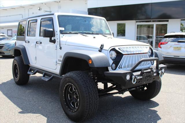 used 2018 Jeep Wrangler JK Unlimited car, priced at $26,981