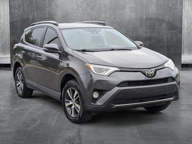 used 2018 Toyota RAV4 car, priced at $17,990