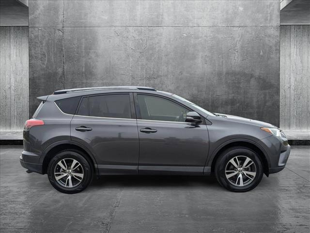 used 2018 Toyota RAV4 car, priced at $17,990