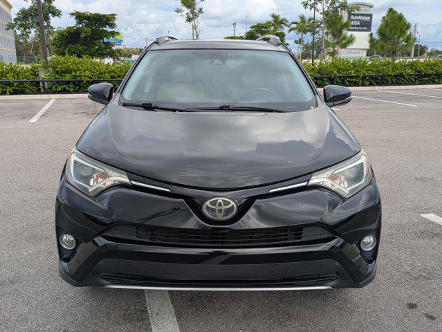 used 2018 Toyota RAV4 car, priced at $17,318