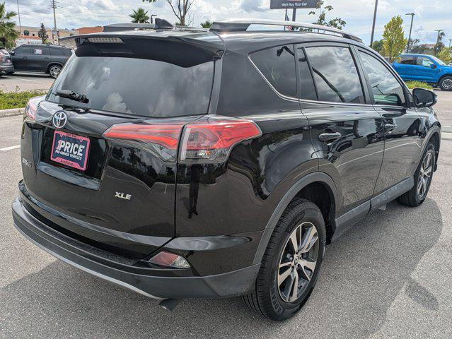 used 2018 Toyota RAV4 car, priced at $17,318