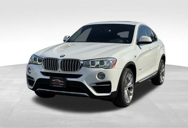 used 2016 BMW X4 car, priced at $17,950