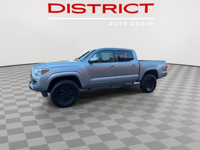 used 2023 Toyota Tacoma car, priced at $25,690