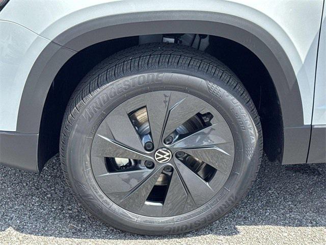 new 2025 Volkswagen Taos car, priced at $27,011