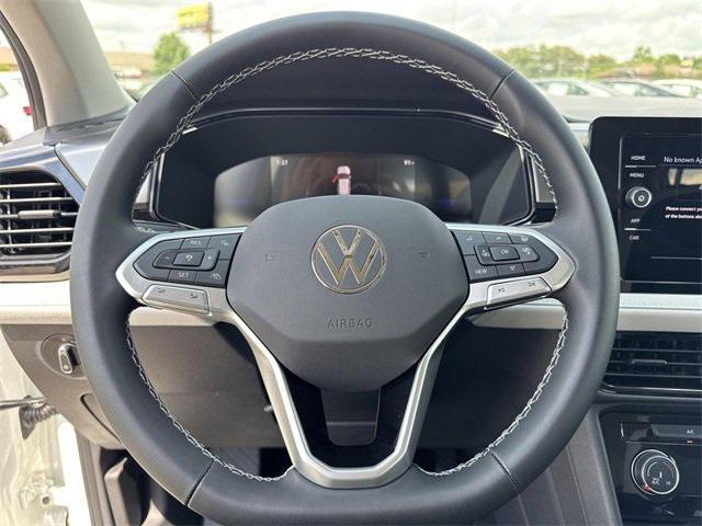 new 2025 Volkswagen Taos car, priced at $27,011