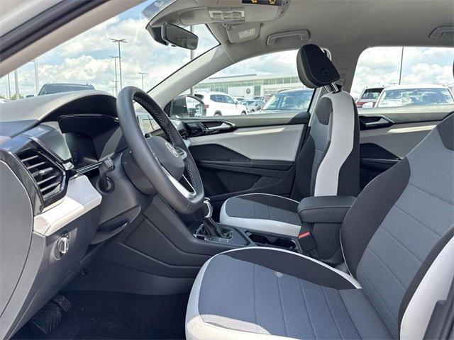 new 2025 Volkswagen Taos car, priced at $27,011