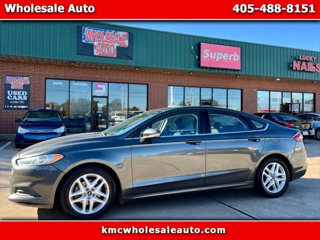 used 2016 Ford Fusion car, priced at $7,950