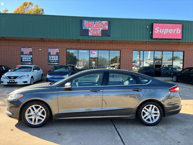 used 2016 Ford Fusion car, priced at $8,900