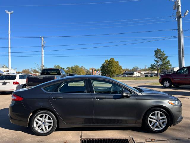 used 2016 Ford Fusion car, priced at $8,900