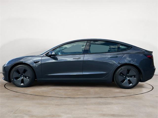 used 2022 Tesla Model 3 car, priced at $28,000