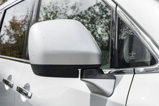 used 2012 Nissan Quest car, priced at $6,000