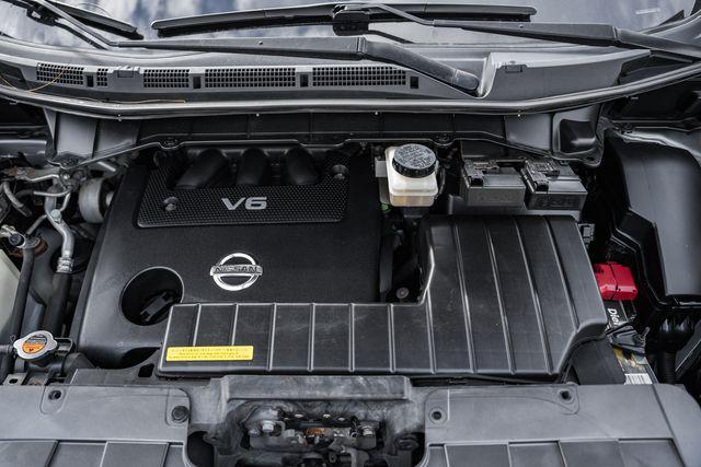 used 2012 Nissan Quest car, priced at $6,000